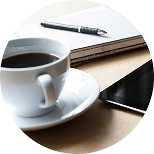 Cup of coffee and office items